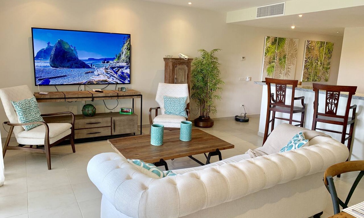 Bavaro Condo | NEW CONDO ON GOLF COURSE WITH PRIVATE CLUB BEACH