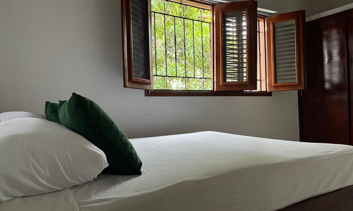 La Iglesia Apartment | Traditional 2BR Dominican Home with Private Balcony - 10 Min Walk to Beach