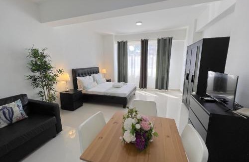 Bavaro Apartment | SUNNY SUITES with ROOFTOP POOL and SPA - PLAYA LOS CORALES