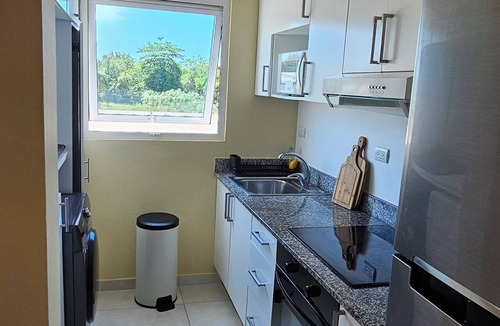 Villas Del Mar Apartment | 2 bedrooms | Balcony overlooking the pool | 2 parking spaces | Near Hemingway Beach.
