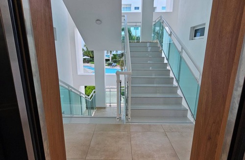 Villas Del Mar Apartment | 2 bedrooms | Balcony overlooking the pool | 2 parking spaces | Near Hemingway Beach.