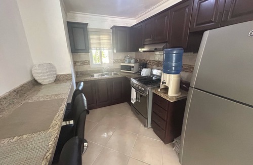 El Batey Condo | Air-conditioned 1 bed 1 full bath 1 half bath apartment. Hot Water & generator.