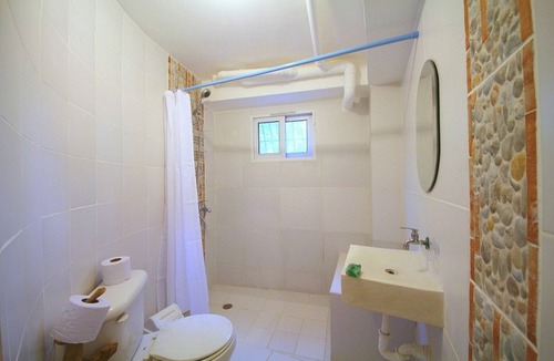 Cabarete House | Budget room in beachfront guesthouse, steps from Playa Encuentro's surfing spot