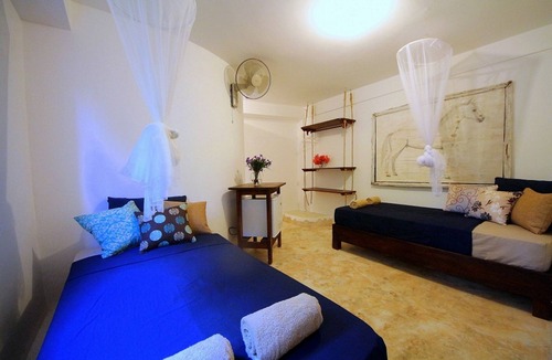 Cabarete House | Budget room in beachfront guesthouse, steps from Playa Encuentro's surfing spot