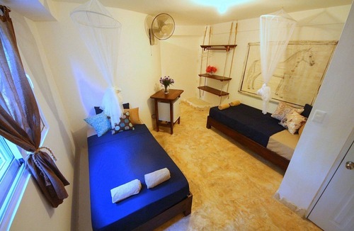 Cabarete House | Budget room in beachfront guesthouse, steps from Playa Encuentro's surfing spot