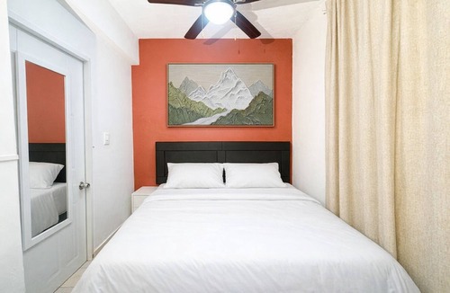 El Batey Apartment | Central & Secure: Pool Fast WiFi Private Hotel amenities.