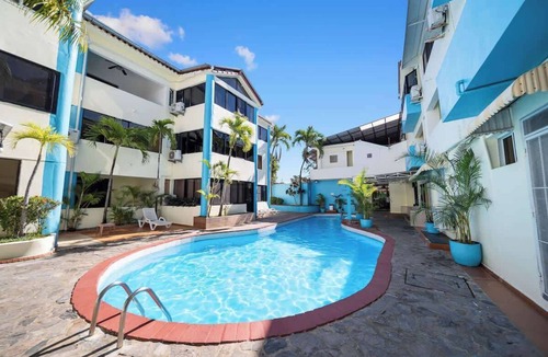 El Batey Apartment | Centric Studio in Sosua Center Pool & Workspace