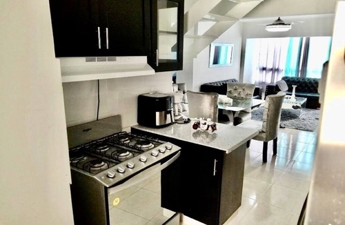 Licey al Medio Apartment | Comfortable apartment, 24/7 security, 8 minutes from the airport.
