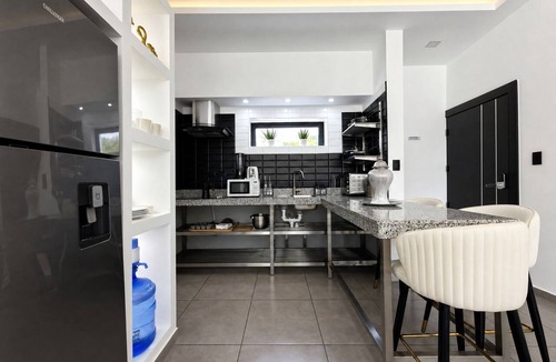 El Batey Apartment | Cozy 1-bedroom apartment in tranquil Sosúa with AC, Hot Water, Pool and GYM