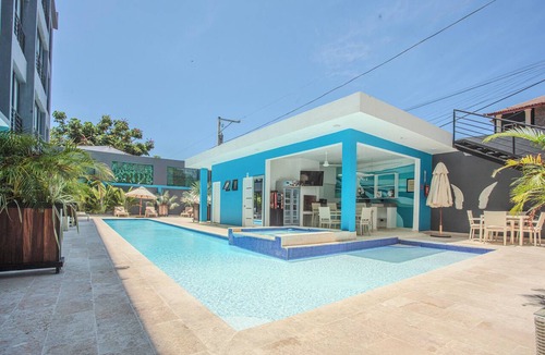 El Batey Apartment | Cozy 1BR suite at Rizz Suites – GYM, Pool, A/C & Walk to Beach