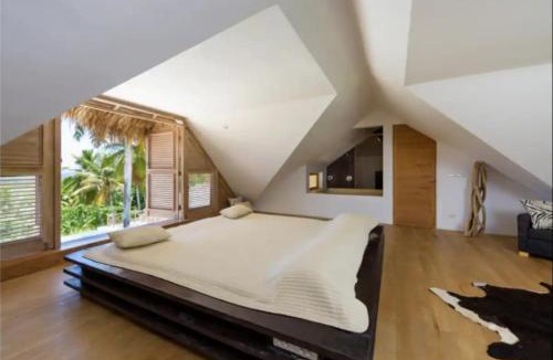 Las Terrenas Villa | Grandi spazi vista mare piscina infinity con grotta taina