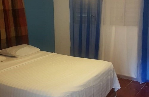El Batey Hotel | Guest-friendly hotel room in Sosua center, AC/TV/Wi-Fi
