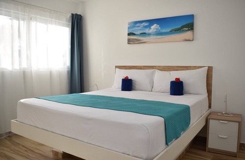 Cabarete Hotel | Hotel suite near beach, with cable TV/Wi-Fi/AC/parking, large swimming pool