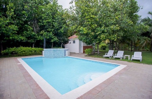 Juan Dolio Villa | Impressive villa with pool at Metro Country Club.