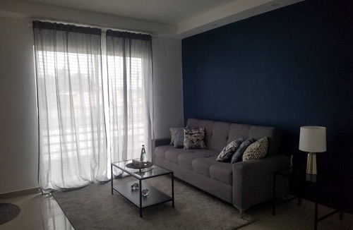 San Pedro de Macoris Condo | Lovely 2-bedroom apartment with private parking