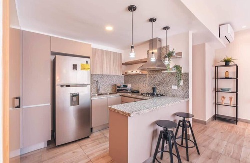 Downtown Santo Domingo Apartment | Luxury Piantini Apt: Rooftop Pool & Gym Access