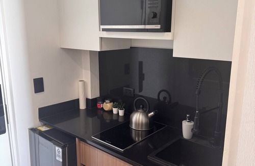 Punta Cana Apartment | Luxury Suite Downtown Punta Cana. 2 min Walk to Coco Bongo Pool, Gym & Parking