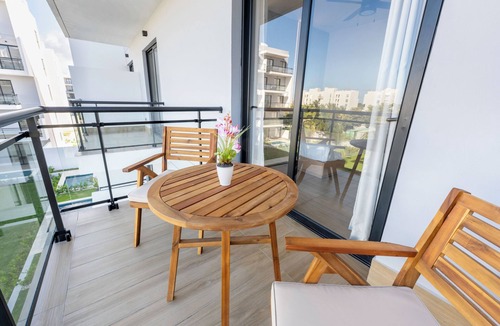 Punta Cana Apartment | Luxury Suite Downtown Punta Cana. 2 min Walk to Coco Bongo Pool, Gym & Parking