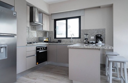 Downtown Santo Domingo Condo | Modern city center apartment near Blue Mall with pool and cafe, fast wifi