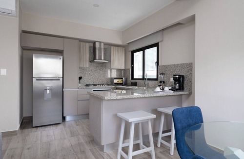 Downtown Santo Domingo Condo | Modern city center apartment near Blue Mall with pool and cafe, fast wifi