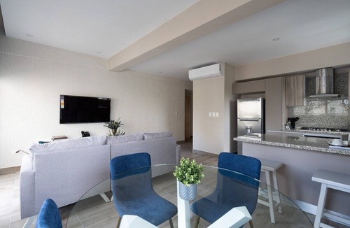 Downtown Santo Domingo Condo | Modern city center apartment near Blue Mall with pool and cafe, fast wifi