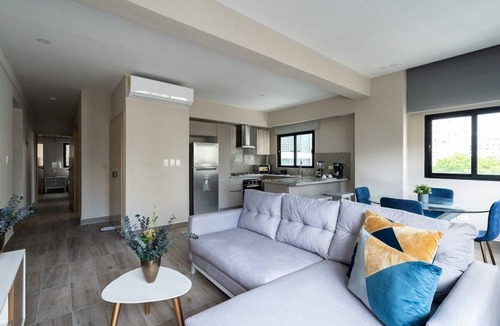 Downtown Santo Domingo Condo | Modern city center apartment near Blue Mall with pool and cafe, fast wifi