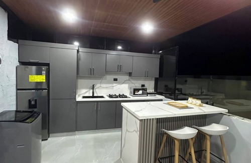 La Vega Province Apartment | Modern loft + terrace kitchen | in a residential complex