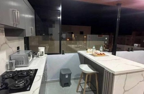 La Vega Province Apartment | Modern loft + terrace kitchen | in a residential complex