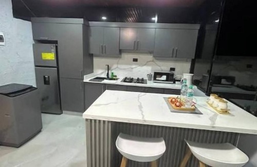 La Vega Province Apartment | Modern loft + terrace kitchen | in a residential complex