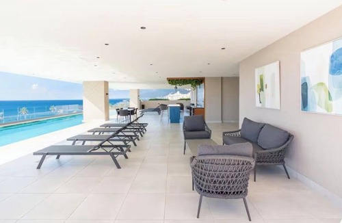 Santo Domingo Apartment | Modern Ocean View Oasis, Pool & Free Parking