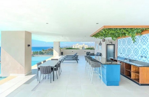 Santo Domingo Apartment | Modern Ocean View Oasis, Pool & Free Parking