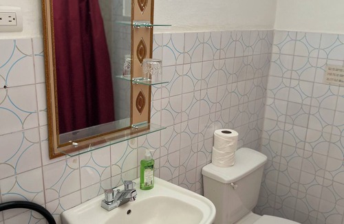 El Batey Hotel | Moe's Economy Hotel
