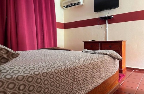 El Batey Hotel | Moe's Economy Hotel