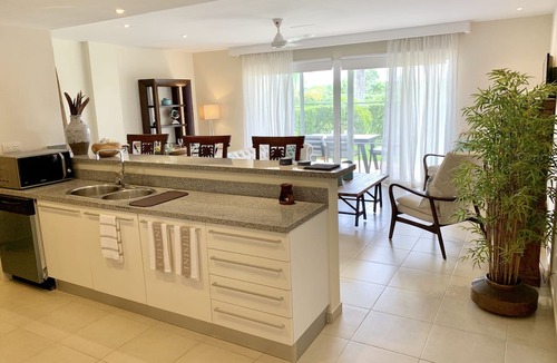 Bavaro Condo | NEW CONDO ON GOLF COURSE WITH PRIVATE CLUB BEACH