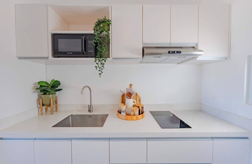 Sosua Apartment | Ocean Village Studio: Pool View, Fast WiFi,