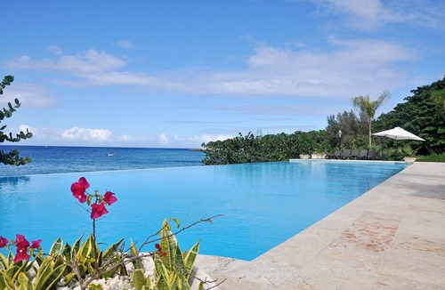 El Batey Apartment | Sea-views condo in beachfront residence steps from shops and restaurants