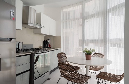 Ensanche Quisqueya Apartment | Sunny 1BR Piantini Retreat Near Blue Mall, Sauna & Pool