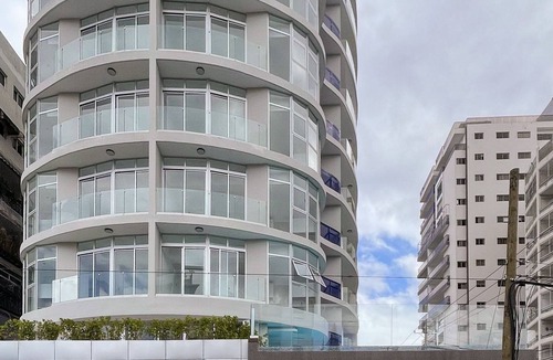 Ensanche Quisqueya Apartment | Sunny 1BR Piantini Retreat Near Blue Mall, Sauna & Pool