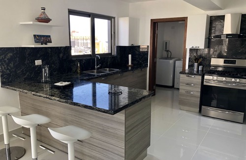 Downtown Santo Domingo Condo | TOP OF THE LINE APT IN PIANTINI WITH POOL & GYM