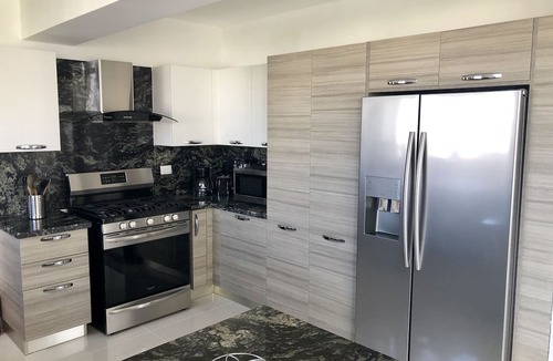 Downtown Santo Domingo Condo | TOP OF THE LINE APT IN PIANTINI WITH POOL & GYM