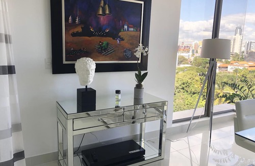 Downtown Santo Domingo Condo | TOP OF THE LINE APT IN PIANTINI WITH POOL & GYM