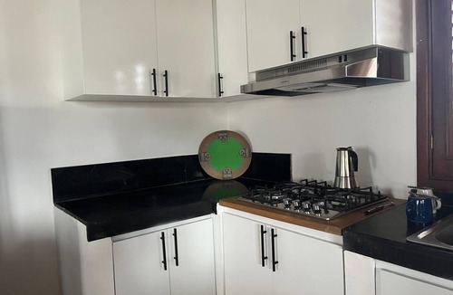 La Iglesia Apartment | Traditional 2BR Dominican Home with Private Balcony - 10 Min Walk to Beach