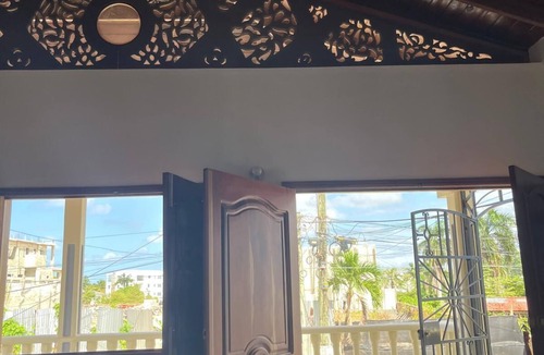 La Iglesia Apartment | Traditional 2BR Dominican Home with Private Balcony - 10 Min Walk to Beach