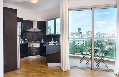 Downtown Santo Domingo House | Upscale 1BR apartment near Blue mall with rooftop by Yellowkey