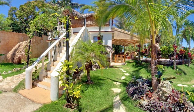 Budget room in beachfront guesthouse, steps from Playa Encuentro's surfing spot