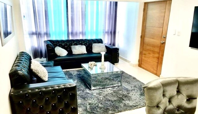 Comfortable apartment, 24/7 security, 8 minutes from the airport. in Licey al medio