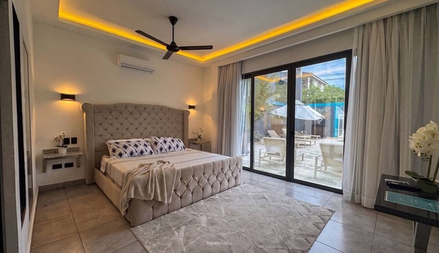 Cozy 1BR suite at Rizz Suites – GYM, Pool, A/C & Walk to Beach in Sosúa