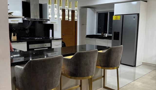 Enjoy a stylish experience at this centrally-located duplex penthouse