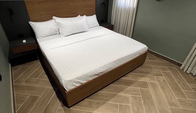 Luxury Minimalist Suite with a Private Living Room and Kitchenette, near the squares. in Higuey
