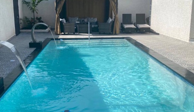Private villa with a pool and a view of the golf course in Puerto Plata